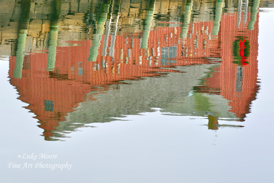 Holiday Season reflection of Rockport fishing shack Motif #1 in Rockport, MA USA New England.  New England landscape photography prints by Luke Moore.